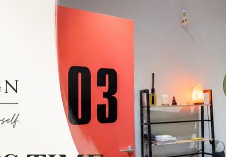 The red door marked Room 3 opening into the Kinesiolign consulting room